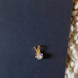 Elegant Gold and Silver Pendant with Diamond